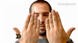 Image result for guy looking at hands