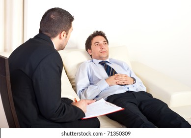 psychiatrist-man-talking-hypnotized-male