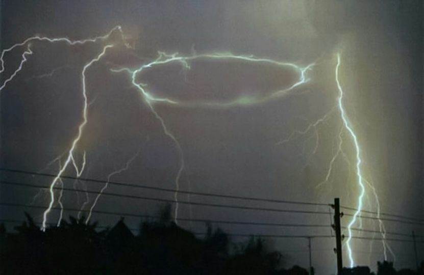 May be an image of standing and lightning