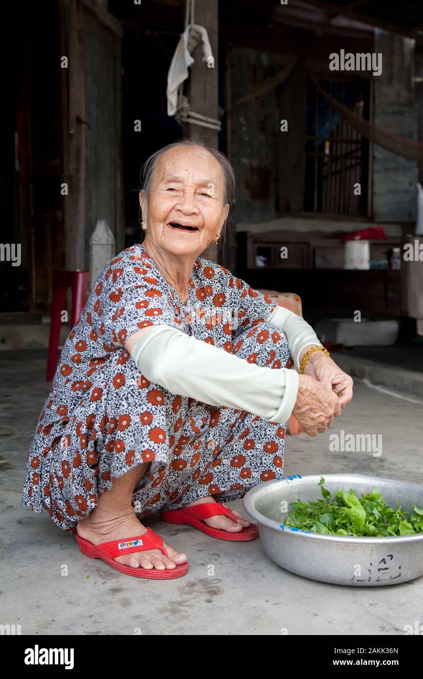 Asian woman in flip flops hi-res stock photography and images - Alamy