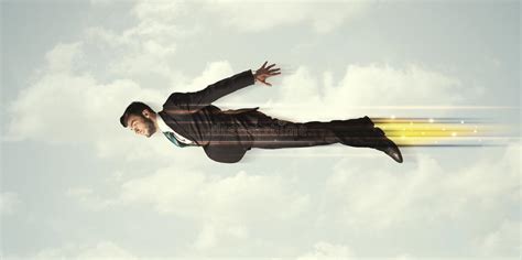 Happy Business Man Flying Fast on the Sky between Clouds Stock Photo ...