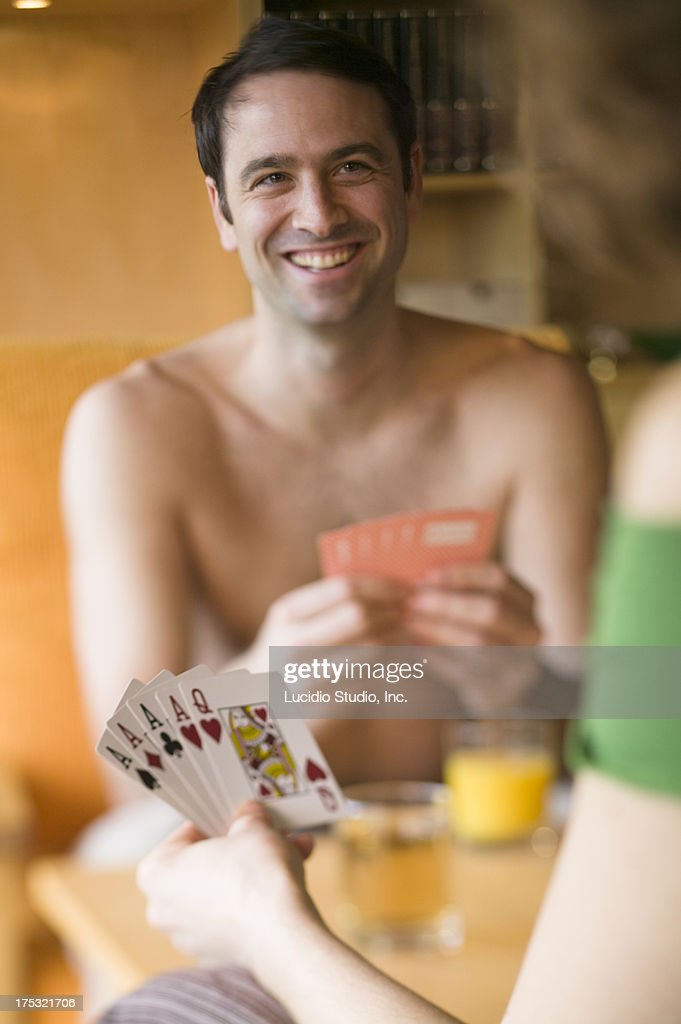 man-losing-at-strip-poker-picture-id1753