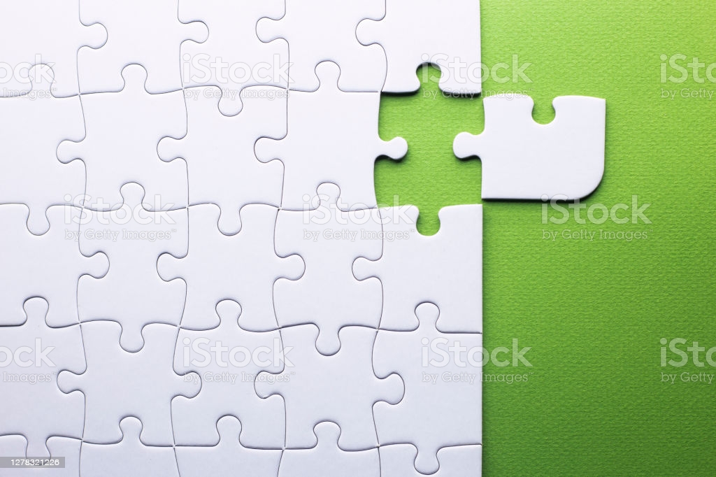 white-puzzle-with-piece-that-does-not-fi