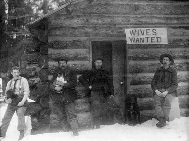 May be an image of 1 person, standing, outdoors and text that says 'WIVES WANTED'