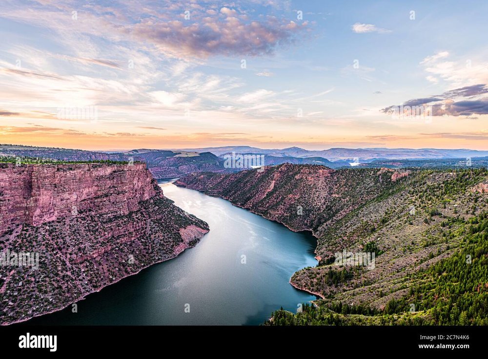 purple-aerial-above-view-from-canyon-rim-trail-overlook-near-campground-in-flaming-gorge-utah-nation-rk-with-green-river-at-sunset-twilight-evenin-2C7N4K6.thumb.jpg.2baa557b7eee796aa5973517a5abc5f9.jpg